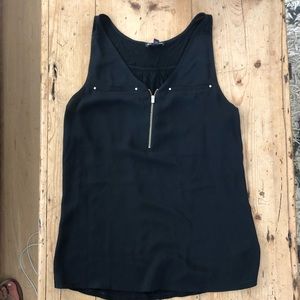 Black silky tank with gold zipper down the front